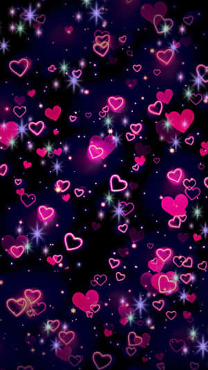 A Collection Of Adorable Hearts Floating In Midair On A Pink Gradient Background Wallpaper