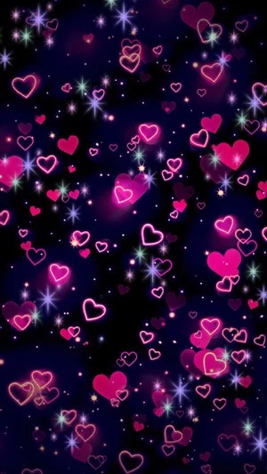 A Collection Of Adorable Hearts Floating In Midair On A Pink Gradient Background Wallpaper