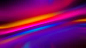 A Colorful Abstract Background With A Rainbow Of Colors Wallpaper