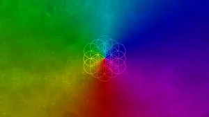 A Colorful Background With A Rainbow Colored Pattern Wallpaper