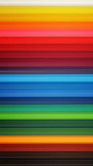 A Colorful Background With A Rainbow Of Colors Wallpaper