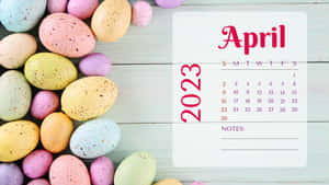 A Colorful Easter Egg Calendar With The Word April 2020 Wallpaper