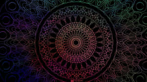 A Colorful Mandala On A Black Background Wallpaper