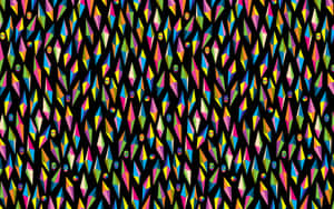 A Colorful Pattern With Triangles On Black Wallpaper