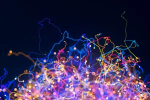 A Colorful Sunset Reflecting On Water Wallpaper