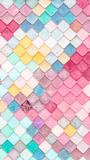 A Colorful Tile Pattern With A Fish Scale Pattern Wallpaper