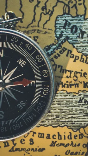 A Compass On A Map Wallpaper