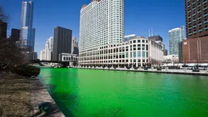 A Cozy Beachfront Home In A Vibrant Sunrise Wallpaper