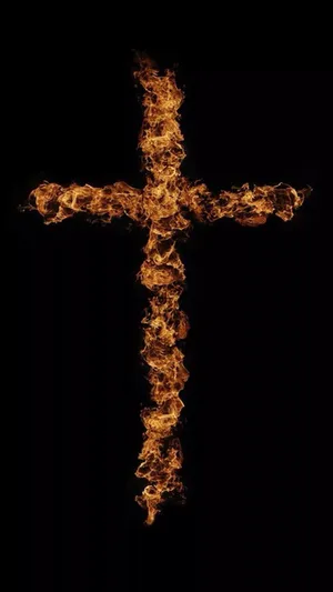 A Cross Made Of Fire On A Black Background Wallpaper