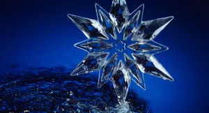 A Crystal Star Is Floating In Water Wallpaper