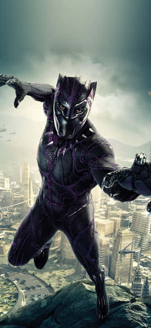 A Cute Black Panther With Big Green Eyes Wallpaper