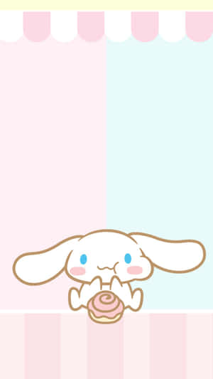 A Cute Bunny With A Donut On A Pink Background Wallpaper