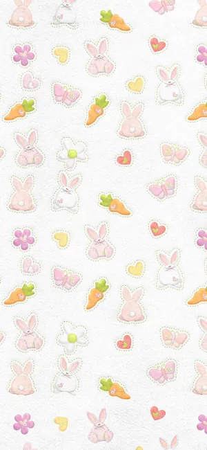 A Cute Pink Bunny Sitting In A Garden Wallpaper