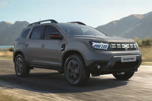 A Daring Dacia Duster Cruising The Highways Wallpaper