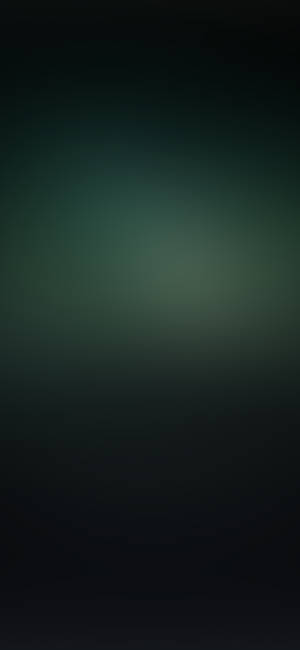 A Dark Green Background With A Blurred Background Wallpaper