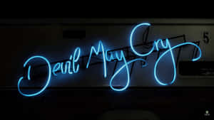 A Dazzling Display Of Blue Neon Lights. Wallpaper