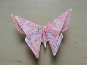 A Delicate Origami Butterfly Brings A Paper Art Masterpiece To Life. Wallpaper