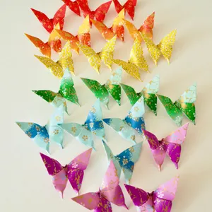 A Delicate Paper Origami Butterfly Embellishes The Corner Of The Room. Wallpaper