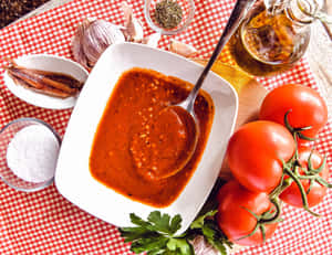 A Delicious Bowl Of Red Sauce Wallpaper