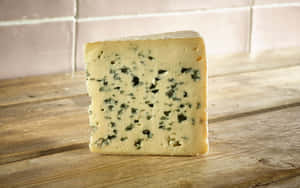 A Delicious Wedge Of Blue Cheese, Perfect For Salads Or Just For Snacking