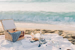 A Delightful Beach Picnic With Friends And Family Wallpaper