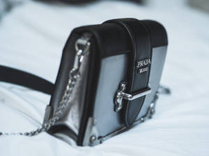 A Designer Prada Bag For The Modern Woman Wallpaper