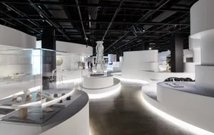 A Diverse Range Of People Admiring A Colorful Art Exhibition Wallpaper