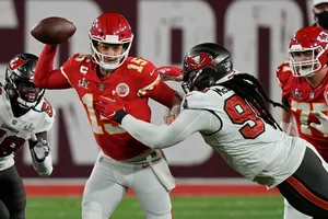 A Dynamic Football Tackle Moment Wallpaper