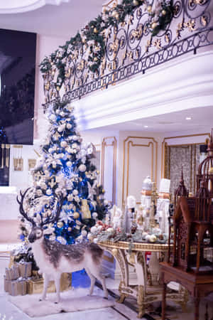 A Festive, Glowing Aesthetic Christmas Tree With A Shimmering Star Topper. Wallpaper