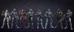 A Fierce Group Of Halo Spartans Standing Ready For Battle. Wallpaper