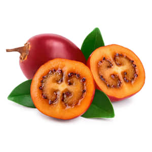 A Fresh And Ripe Tamarillo Fruit In A Tropical Setting Wallpaper