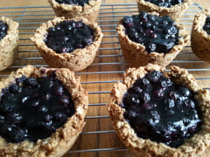 A Freshly Baked And Delicious Blueberries Tart. Wallpaper