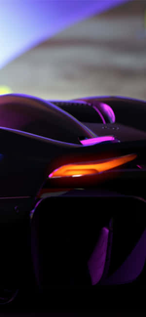 A Futuristic Car With A Bright Light Shining On It Wallpaper