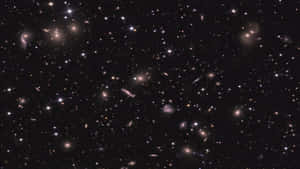 A Futuristic Spaceship Approaching An Unknown Galaxy Wallpaper