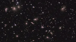 A Futuristic Spaceship Approaching An Unknown Galaxy Wallpaper