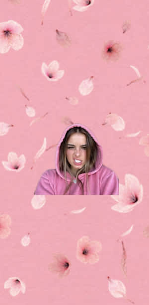 A Girl In A Pink Hoodie With Flowers On Her Face Wallpaper