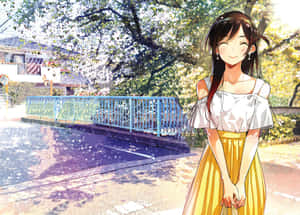 A Girl In A Yellow Skirt Standing On A Street Wallpaper