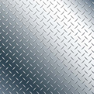 A Gleaming Metallic Surface Of Diamond Plate Wallpaper