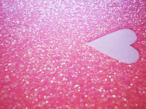 A Glittery Pink Heart Awakens Joy And Sparkles With Delight Wallpaper