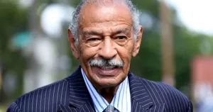 A Grayscale Portrait Of Former U.s Representative John Conyers Wallpaper
