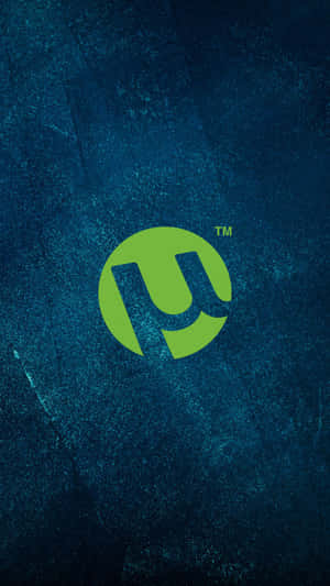 A Green Logo On A Blue Background Wallpaper