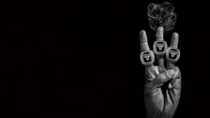 A Group Of Gang Members With Sprayed Graffiti Wallpaper