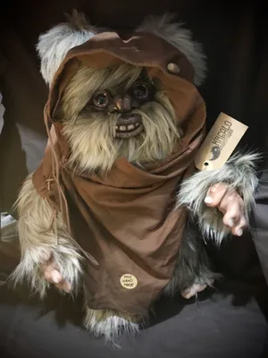 A Group Of Happy Ewoks Enjoying Their Time On A Treetop Village In The Forest Moon Of Endor. Wallpaper