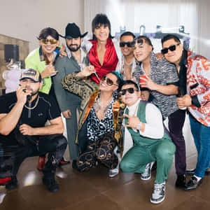 A Group Of Men Posing For A Photo Wallpaper