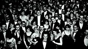 A Group Of People In Tuxedos And Tuxedos Wallpaper