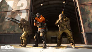 A Group Of Soldiers In Camouflage Are Standing In Front Of A Building Wallpaper