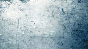 A Grungy Blue Background Full Of Unique Texture Wallpaper