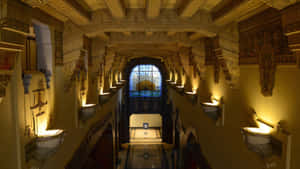 A Hallway With A Large Window Wallpaper