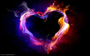 A Heart Shaped Fire On A Black Background Wallpaper