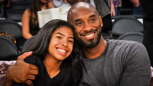 A Heartwarming Bond: Kobe And Gigi Bryant's Basketball Journey Wallpaper